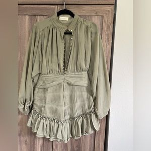 Sage green mini long sleeve dress. Sheer sleeves and ruffles